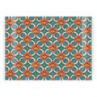 orange and blue floral tile printed glass chopping board