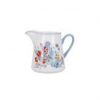 white and pale blue floral ceramic milk jug from the london pottery meadow collection