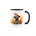 white and black ceramic mug with a halloween themed dog design