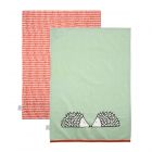 set of two tea towels, one green with a hedgehog print and one orange and white
