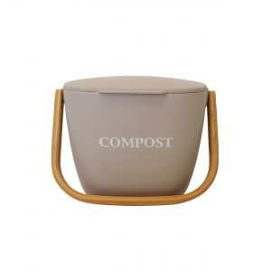 Compost caddy in a pale grey, with a bamboo handle