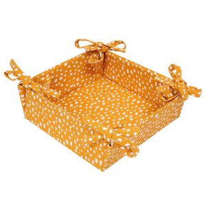 Square foldable bread basket made from ochre coloured recycled cotton, with a white polka dot print.